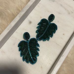 Leaf embellished earrings